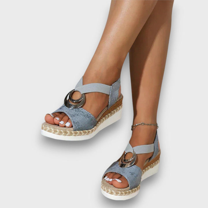 Solennea – Wedge Sandal with Golden Silhouette